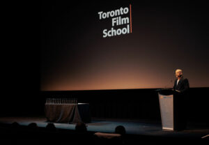 Photo of TFS President Andrew Barnsley on stage at the 2023 TFS Film Festival