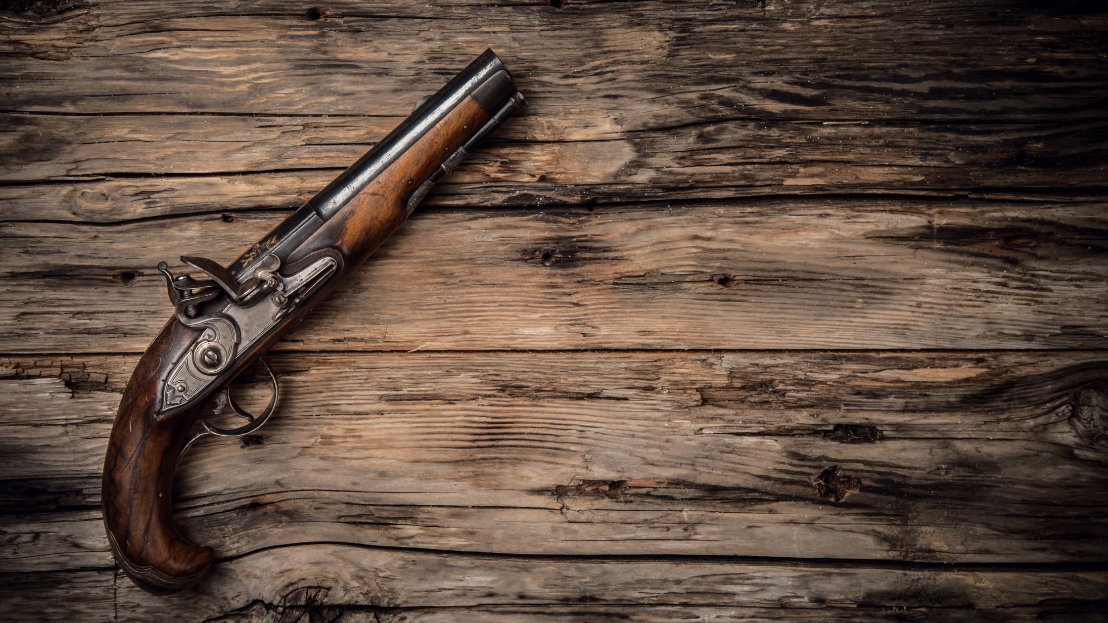 Image of a gun to represent the narrative principle "Chekhov's Gun'.