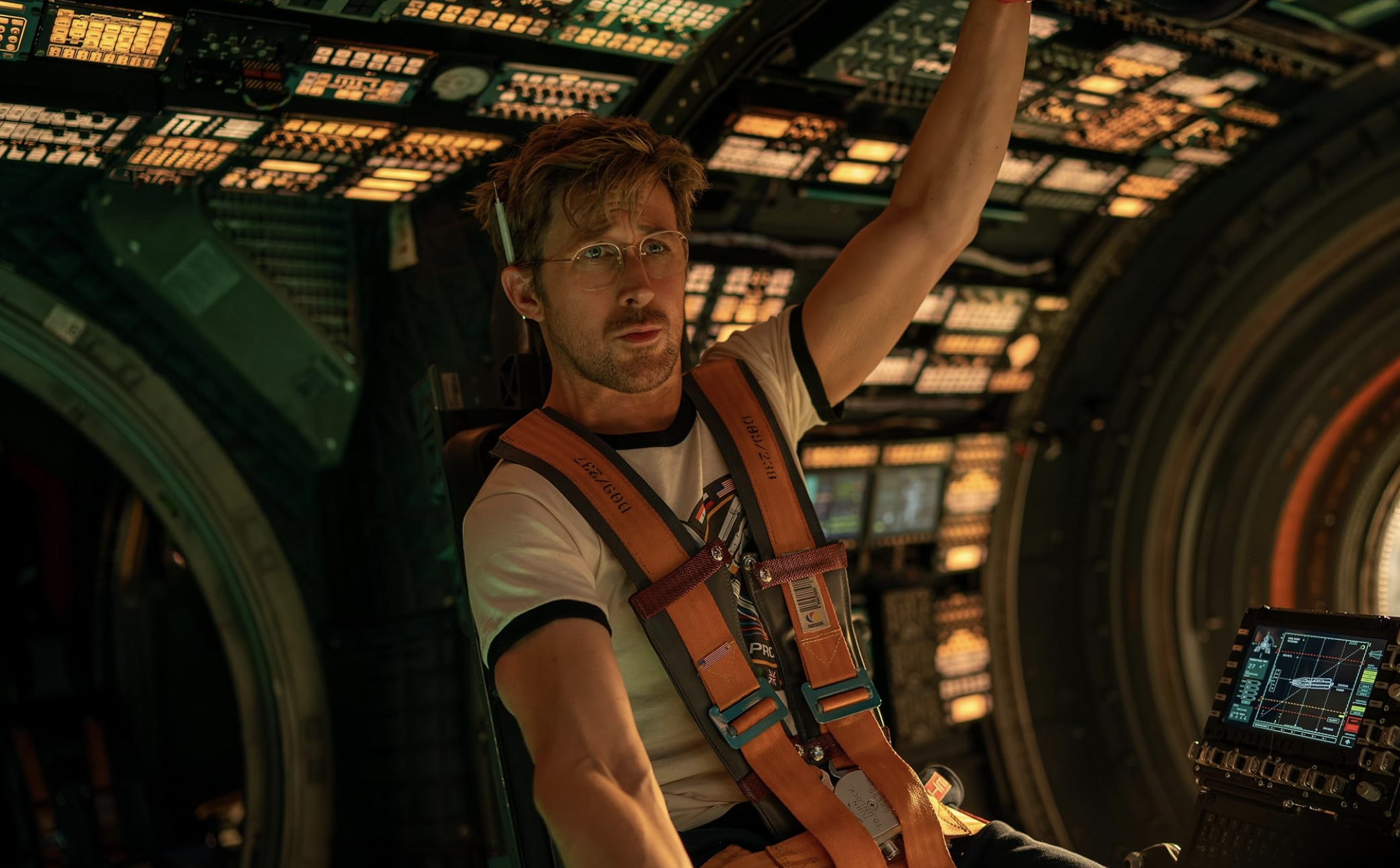 Image of Ryan Gosling as Doctor Ryland Grace. Here he is seen in his spaceship, all alone, in the film Project Hail Mary.