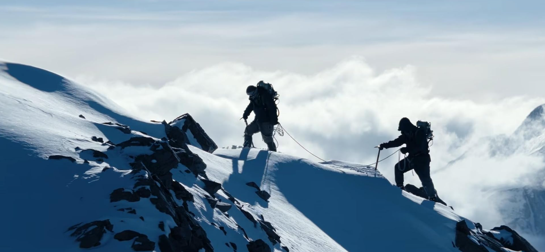 Image of two mountaineers from the movie Tenzing. Tenzing is based on the true story of the two climbers who were the first to reach the top of Mount Everest.